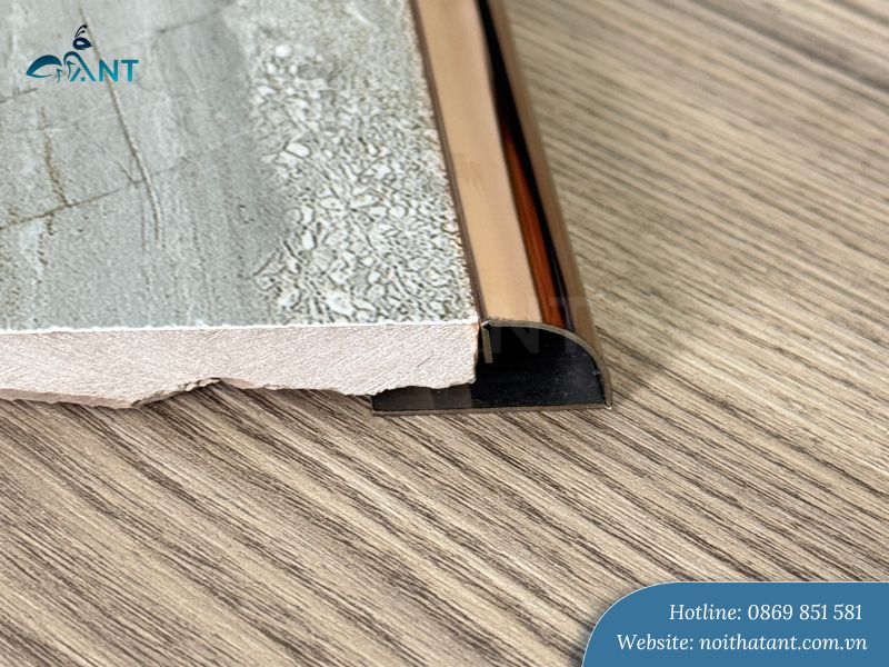 Nẹp inox bo góc tròn màu hồng gương